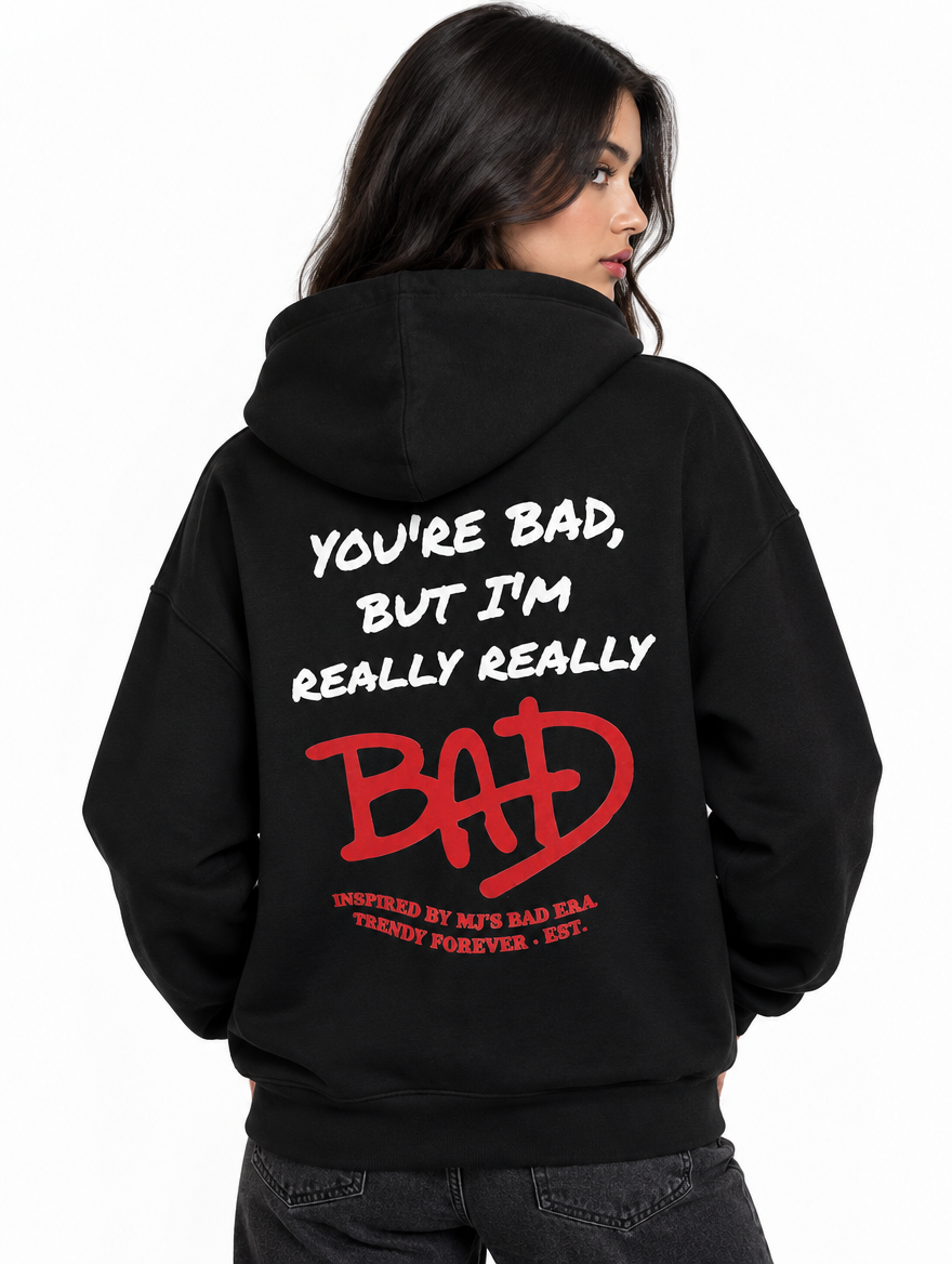 Model wearing the black BAD Hoodie Unisex, back print view